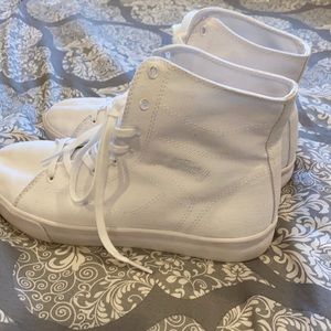 White canvas high tops